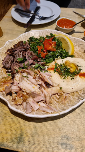 Photo of Hiba Street Food - 10 Tottenham St, London W1T 4RD, UK