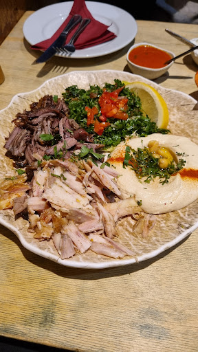 Photo of Hiba Street Food - 10 Tottenham St, London W1T 4RD, UK