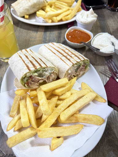 Photo of Hiba Street Food - 10 Tottenham St, London W1T 4RD, UK