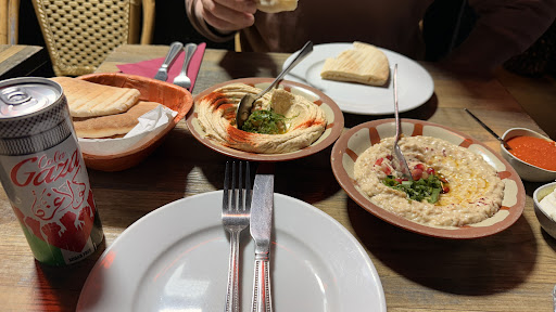 Photo of Hiba Street Food - 10 Tottenham St, London W1T 4RD, UK