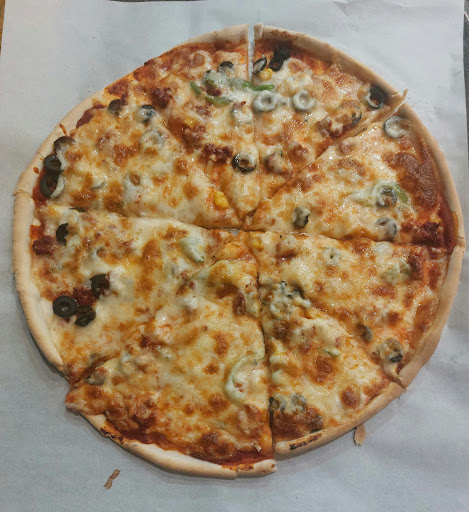 Photo of Basil Broasted بروستد وشاورما الريحان - 222 Kilburn High Rd, London NW6 4JP, UK