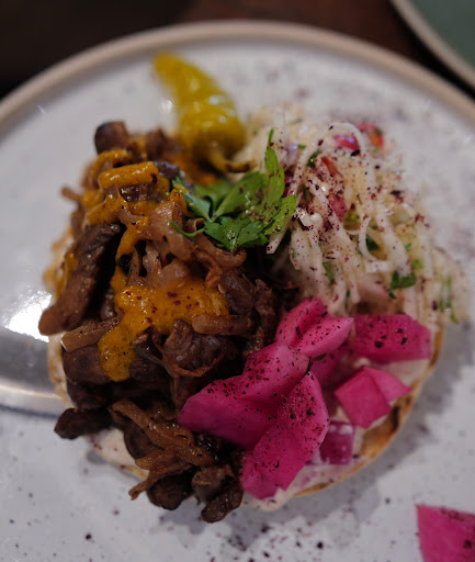 Photo of Honey & Smoke Grill House - 216 Great Portland St, London W1W 5QW, UK