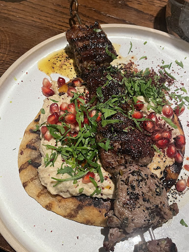 Photo of Honey & Smoke Grill House - 216 Great Portland St, London W1W 5QW, UK