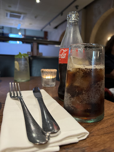 Photo of Honey & Smoke Grill House - 216 Great Portland St, London W1W 5QW, UK