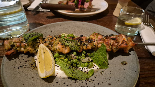 Photo of Honey & Smoke Grill House - 216 Great Portland St, London W1W 5QW, UK