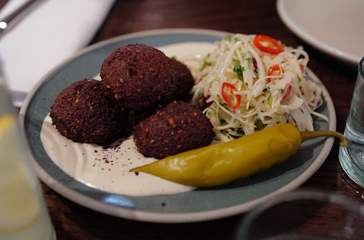 Photo of Honey & Smoke Grill House - 216 Great Portland St, London W1W 5QW, UK