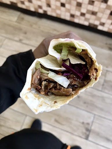 Photo of Woody Grill Camden - 25 Camden High St, London NW1 9DL, UK