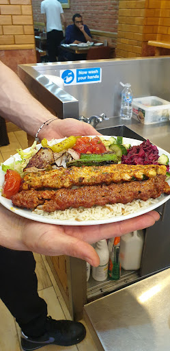 Photo of Woody Grill Camden - 25 Camden High St, London NW1 9DL, UK