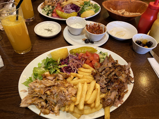 Photo of Woody Grill Camden - 25 Camden High St, London NW1 9DL, UK