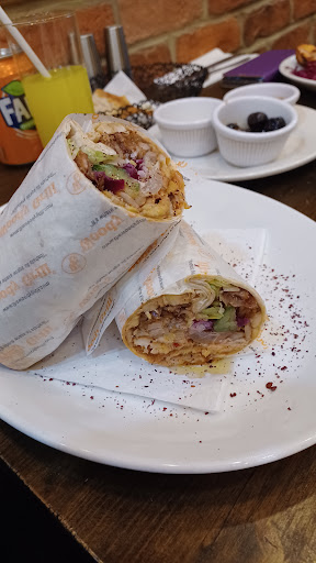 Photo of Woody Grill Camden - 25 Camden High St, London NW1 9DL, UK