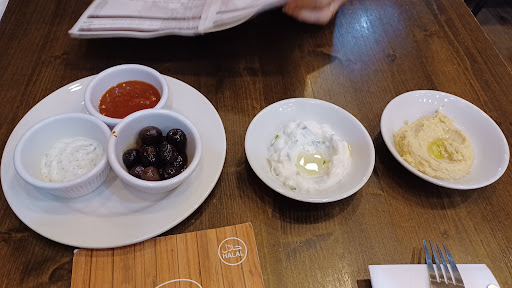 Photo of Woody Grill Camden - 25 Camden High St, London NW1 9DL, UK