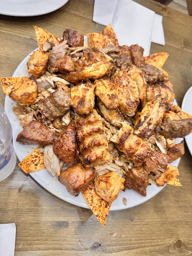 Photo of Woody Grill Camden - 25 Camden High St, London NW1 9DL, UK