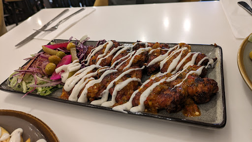 Photo of Alek’s Restaurant - Aleks Artisan Mastery, 116 Commercial Rd, London E1 1NL, UK