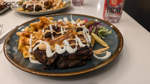 Photo of Alek’s Restaurant - Aleks Artisan Mastery, 116 Commercial Rd, London E1 1NL, UK