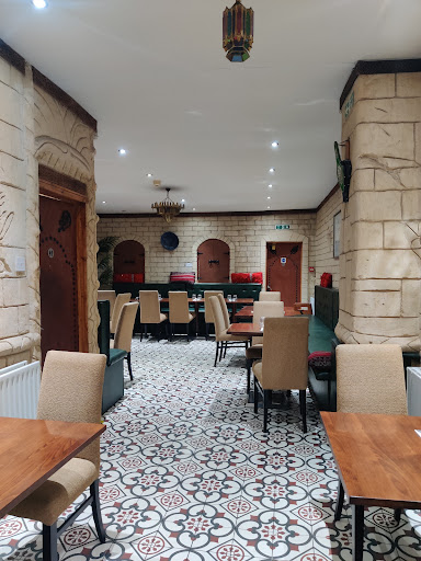 Photo of Amal Restaurant - 42 High Street Colliers Wood, London SW19 2AB, UK