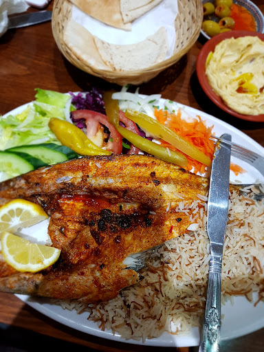 Photo of Amal Restaurant - 42 High Street Colliers Wood, London SW19 2AB, UK