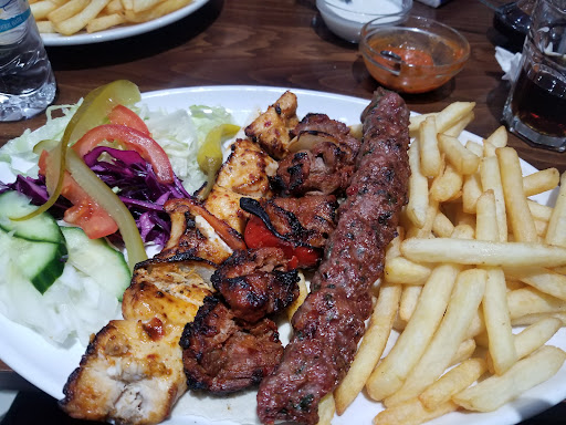 Photo of Amal Restaurant - 42 High Street Colliers Wood, London SW19 2AB, UK