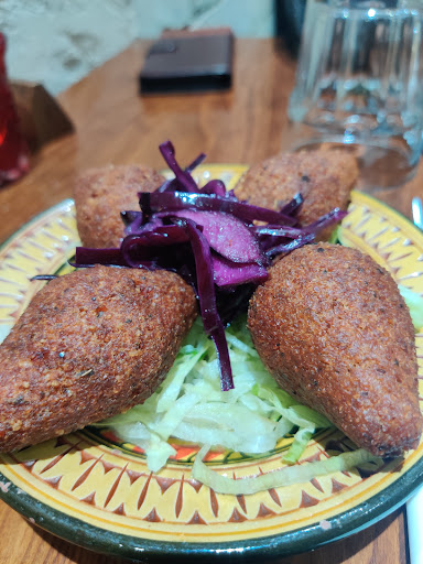 Photo of Amal Restaurant - 42 High Street Colliers Wood, London SW19 2AB, UK