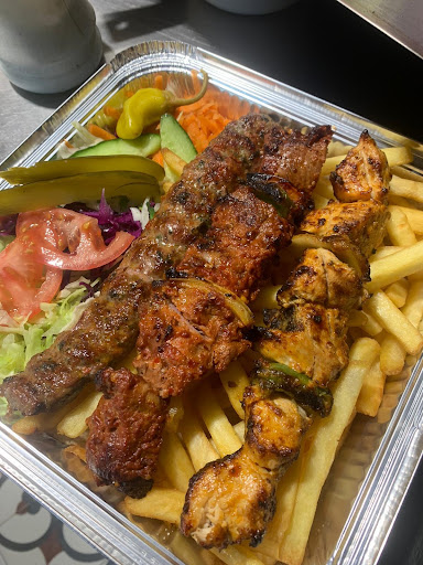 Photo of Amal Restaurant - 42 High Street Colliers Wood, London SW19 2AB, UK