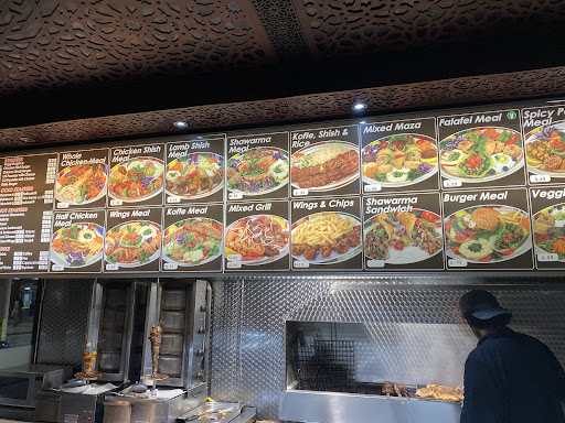 Photo of Amal Restaurant - 42 High Street Colliers Wood, London SW19 2AB, UK