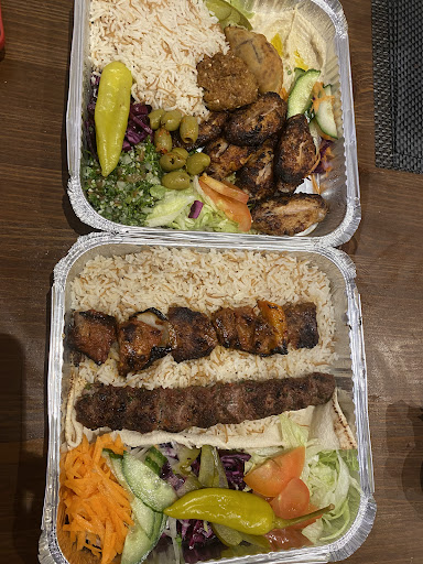 Photo of Amal Restaurant - 42 High Street Colliers Wood, London SW19 2AB, UK