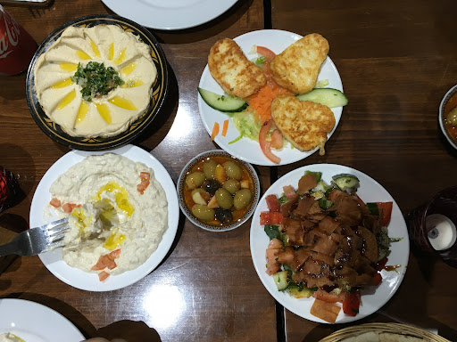 Photo of Amal Restaurant - 42 High Street Colliers Wood, London SW19 2AB, UK