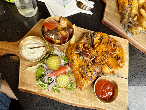 Photo of Rack & Bite Smokehouse and Grill, Shoreditch - 36 Great Eastern St, London EC2A 3ES, UK