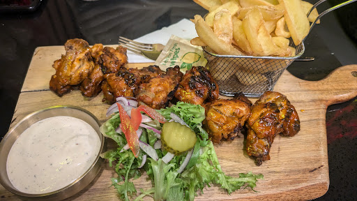 Photo of Rack & Bite Smokehouse and Grill, Shoreditch - 36 Great Eastern St, London EC2A 3ES, UK