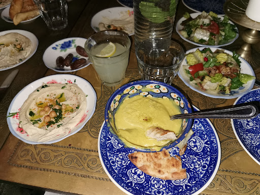 Photo of Yalla Yalla - 12 Winsley St, London W1W 8HQ, UK