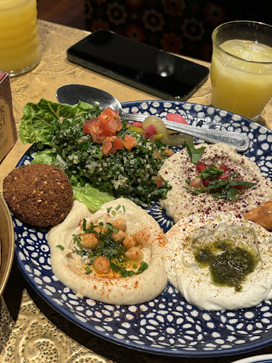 Photo of Yalla Yalla - 12 Winsley St, London W1W 8HQ, UK