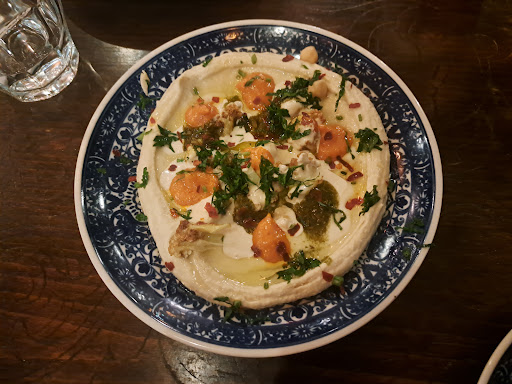 Photo of Yalla Yalla - 12 Winsley St, London W1W 8HQ, UK