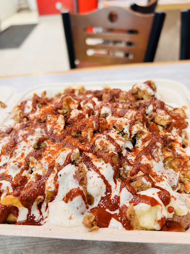 Photo of Osmow's Shawarma - 4850 Dundas St W, Etobicoke, ON M9A 1B4