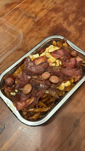 Photo of Poutine ultime - 1040 Boulevard des Laurentides, Laval, QC H7G 2W1