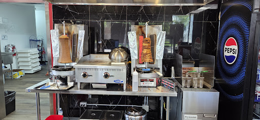 Photo of Cosmic Pizza & Donair - 11801 48 St NW, Edmonton, AB T5W 2Y4