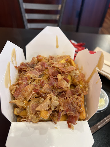 Photo of Smoke's Poutinerie Orillia - 106 Mississaga St E, Orillia, ON L3V 1V7