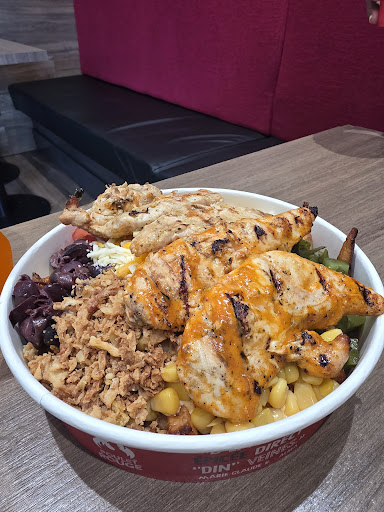 Photo of Restaurant Poulet Rouge St-Sauveur - 153 Chem. Jean-Adam, Saint-Sauveur, QC J0R 1R6