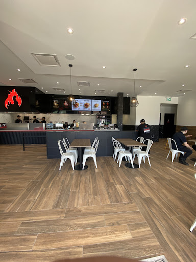 Photo of Restaurant Poulet Rouge St-Sauveur - 153 Chem. Jean-Adam, Saint-Sauveur, QC J0R 1R6