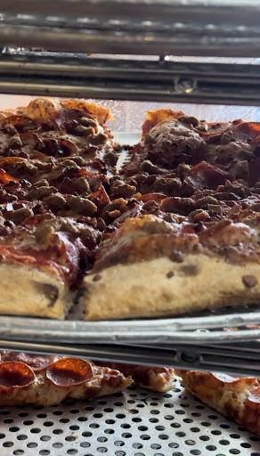 Photo of Gino's Pizza - 253 King St N Unit 2, Waterloo, ON N2J 2Y8