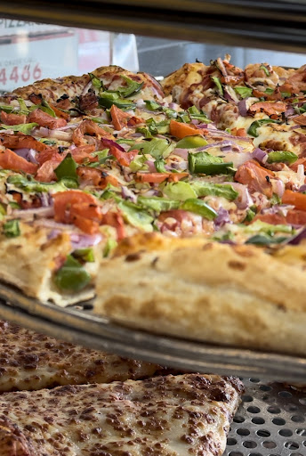 Photo of Gino's Pizza - 253 King St N Unit 2, Waterloo, ON N2J 2Y8