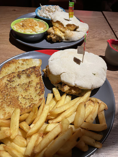 Photo of Nando's Ashford - Unit 5a, Eureka Entertainment, Rutherford Rd, Ashford TN25 4BN