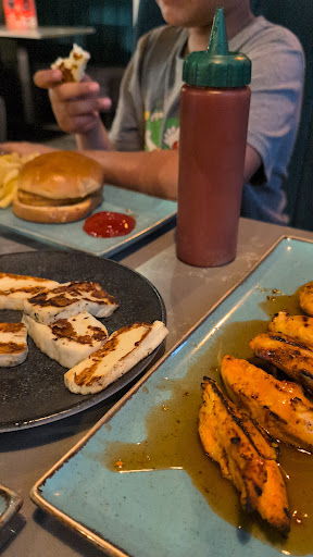 Photo of Moe's Peri Peri Grill - 11 Heritage Ave, London NW9 5FW