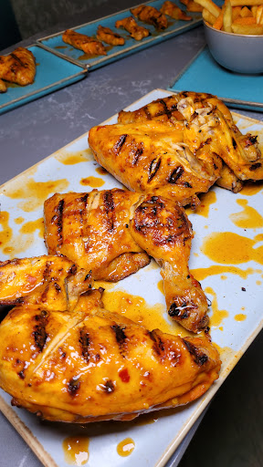 Photo of Moe's Peri Peri Grill - 11 Heritage Ave, London NW9 5FW