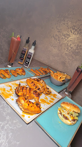 Photo of Moe's Peri Peri Grill - 11 Heritage Ave, London NW9 5FW