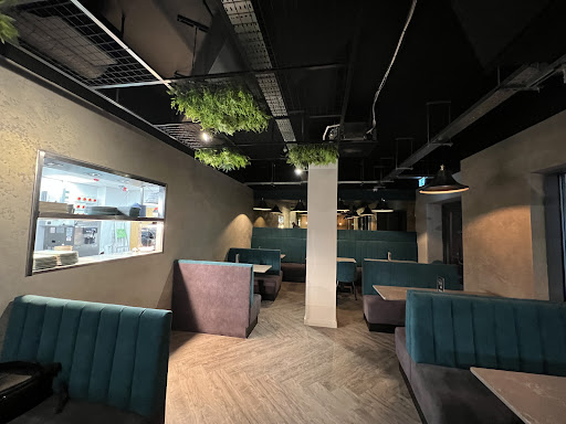 Photo of Moe's Peri Peri Grill - 11 Heritage Ave, London NW9 5FW