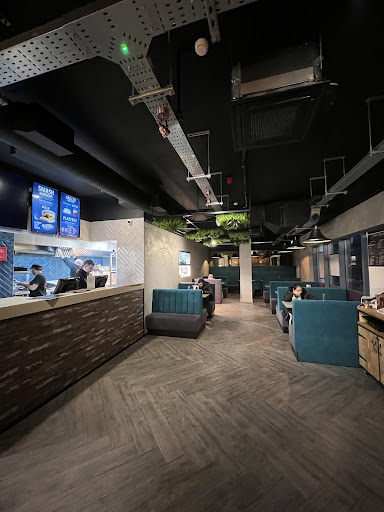 Photo of Moe's Peri Peri Grill - 11 Heritage Ave, London NW9 5FW