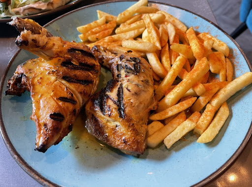 Photo of Moe's Peri Peri Grill - 11 Heritage Ave, London NW9 5FW