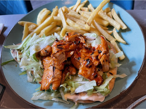 Photo of Moe's Peri Peri Grill - 11 Heritage Ave, London NW9 5FW