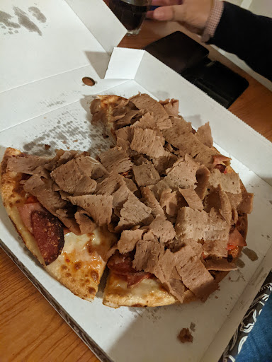 Photo of Bella Pizza - 19 Hole in the Wall St, Caernarfon LL55 1RF