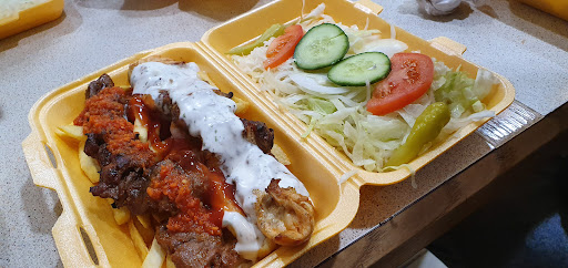 Photo of Ewell village charcoal grill ltd - 7 High St, Ewell, Epsom KT17 1SG
