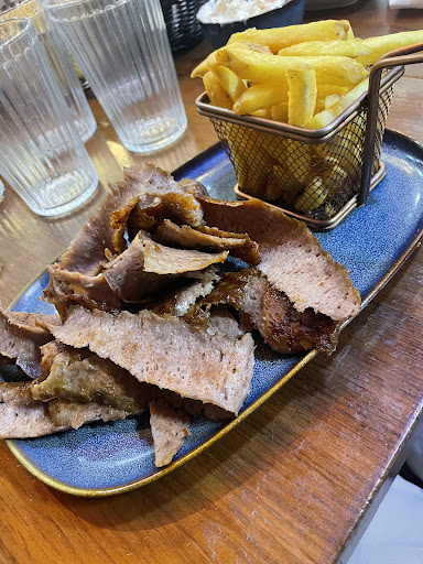 Photo of Rio Grill Epsom - 86 High St, Epsom KT19 8BA